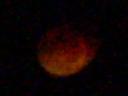 The Dim Orange Moon